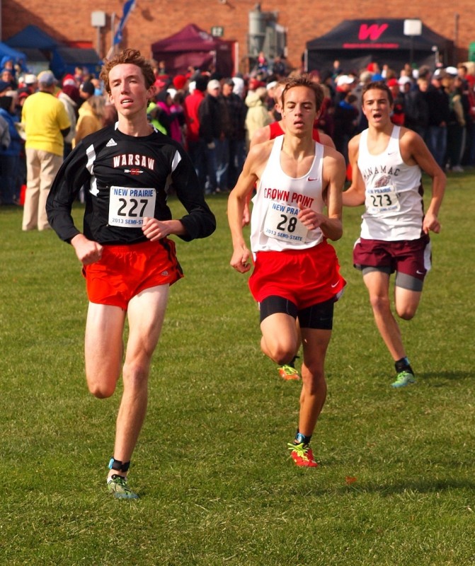 Junior Nick Bergen (at left) has made a huge impact for his state-bound Warsaw cross country team this fall.