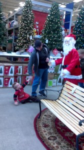 Brandon Busz was freaked out by an animated Santa so any chance dad Chris Busz had of getting him on Santa's lap was ill-fated.