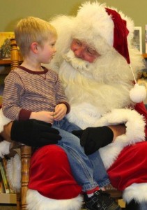 Chase Marshall chats up Santa, whom he visited with Friday in South Whitley.