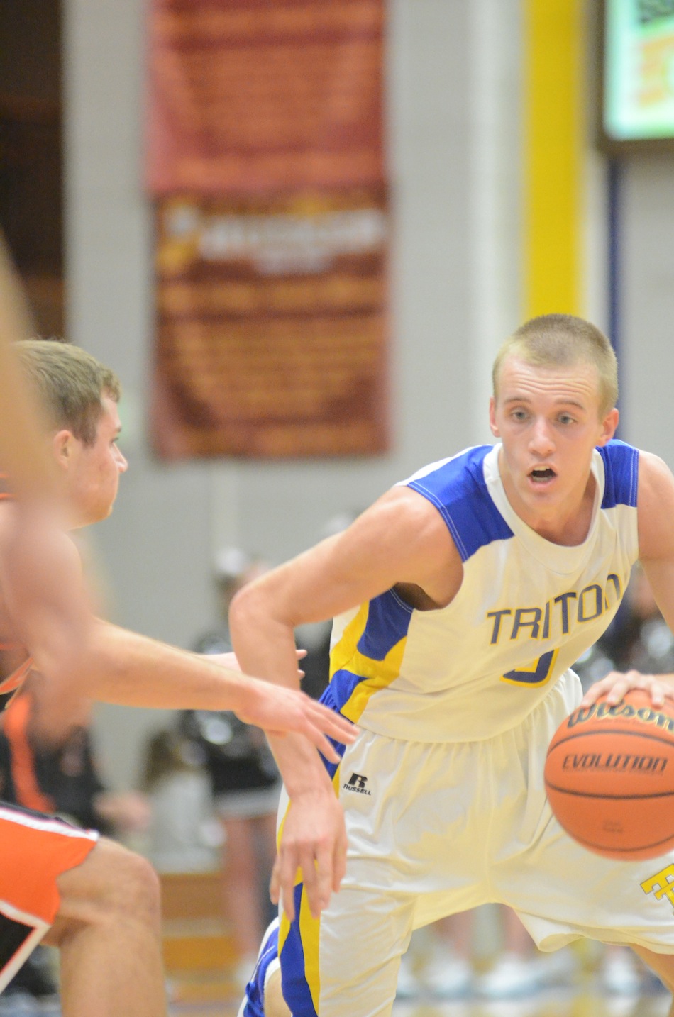 Clay Yeo drives past a Warsaw defender Tuesday night.