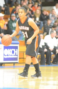 Brooklyn Harrison surveys the scene Wednesday night versus Triton. The Warsaw junior had a strong game in a 49-32 victory.