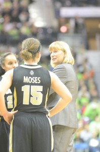 Purdue coach Sharon Versyp, a former star player at Mishawaka High School, talks to Courtney Moses during a timeout Saturday at Notre Dame.
