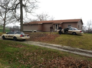 The scene of a Monday break-in where authorities say a man shot several rounds in his ex-girlfriend's car and home. (Photo provided by KCSD)