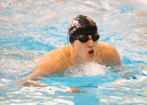 Andrew Busse works his way through the individual medley at Northridge.