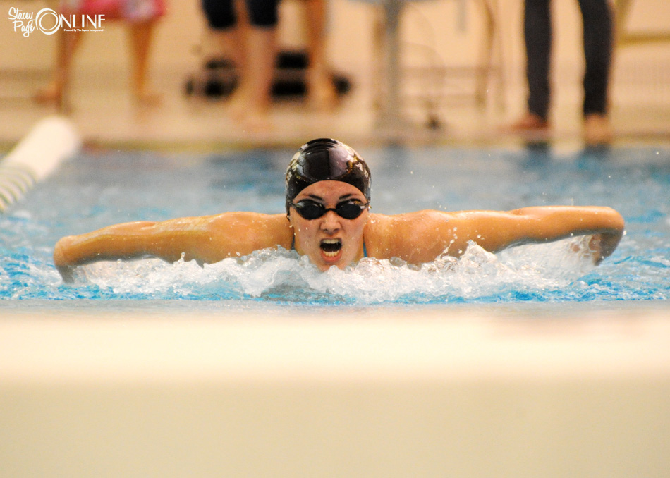 Caitlin Clevenger swims the butterfly at Northridge.