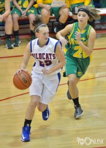 Whitko's Kelly Reiff drives around Cara Hoffman.