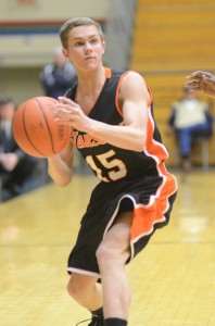 Trae Furnivall of Warsaw prepares to pass the ball during first-half action Tuesday night in Elkhart.