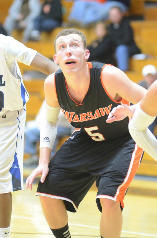 Warsaw's John Swanson prepares to go after a rebound on a free throw attempt Tuesday night. The senior had a game-high 14 points to lead the Tigers to a win versus Elkhart Central.