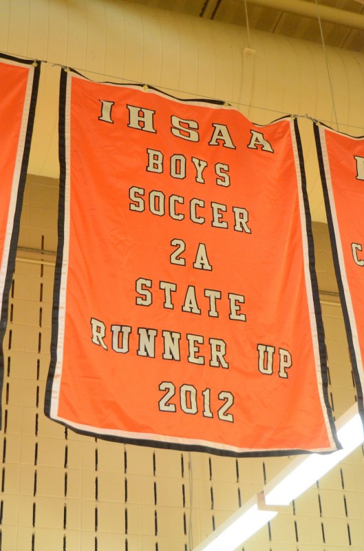 A banner honoring the 2012 Warsaw boys soccer team was unveiled Friday night in the Tiger Den. 