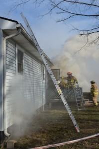 Fire crews battled a blaze at a home at 1681 E. 900 N. near Milford. (Photo by Deb Patterson)