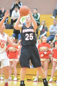 Warsaw's Lindsay Baker goes up for a shot versus Elkhart Memorial in a recent game. The senior standout tied a program record with eight 3-pointers Thursday night.