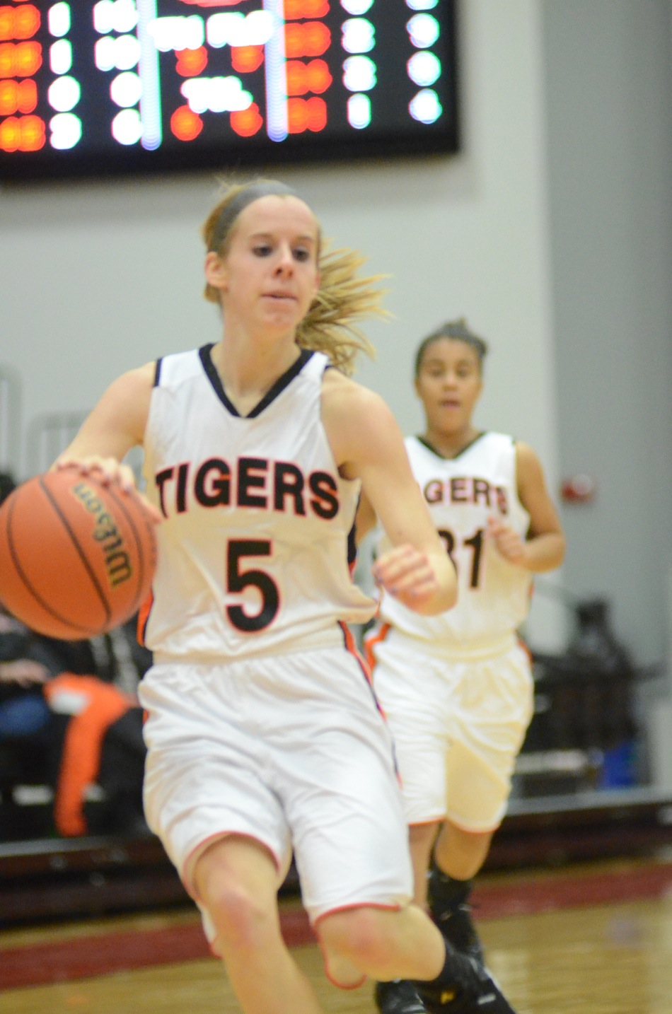 Senior guard Sarah Ray brings the ball up court Thursday night at Grace College. Ray helped the No. 10 Tigers remain undefeated with a 76-49 rout of Marion.