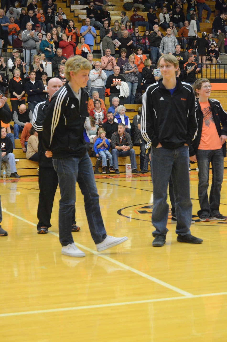 Warsaw seniors Jake Poyner (left) and Robert Murphy are honored Friday night at the boys basketball game. The pair of All-State performers led Warsaw to a fourth-place finish at the State Finals this past fall.