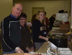 Volunteers Doug Haines, Pat Freeman and Megan Hartley often lend a hand at The Gatherings. 