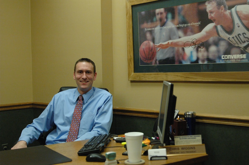 Chris Wiggins, shown in his office at Lake City Bank in Warsaw, heads the Warsaw Breakfast Optimist Club's Tri-Star Basketball Competition set for Feb. 2.