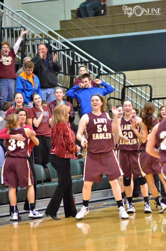 The Columbia City bench celebrates after beating Wawasee by one point Tuesday night.