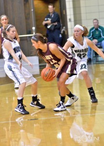 Wawasee defenders Lexy Blunk, left, and KiLee Knafel pressure Columbia City's Megan Deutsch during Tuesday night's game. (Photos by Nick Goralczyk)