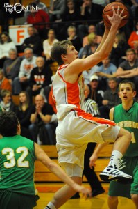 Jason Ferguson of Warsaw goes in for a lay-up Friday night during a home win over Northridge.