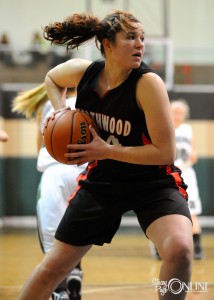 NorthWood forward Morgan Olson rips down one of her 11 rebounds.