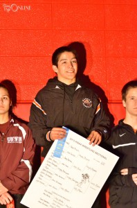 Warsaw's Luis Munoz was an upset winner at the Plymouth Wrestling Sectional, defeating Culver Academy's top seed Kayla Miracle in the final. (Photos by Nick Goralczyk)