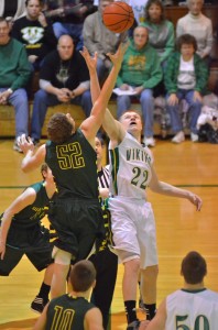 Valley's Tanner Andrews goes up for the opening tip-off against EJ Solina of Wawasee Friday night.