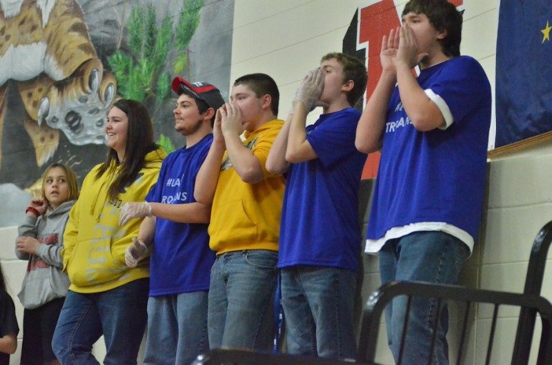 Triton fans cheer on their team Saturday night during the girls basketball sectional championship game at Oregon-Davis.