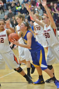 Shana Anderson, who led Triton with a game-high 18 points, finds herself surrounded by a host of Culver defenders.