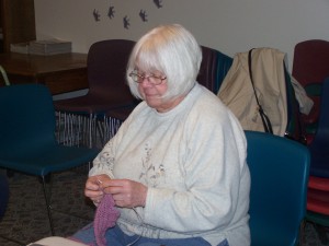 Charlotte Siegfriend, Milford, knits and chats with fellow knitters at the afternoon knitting club that meets every other Friday at 1:30 pm in the library meeting room. The next meeting will be on Feb. 22 at 1:30 pm.
