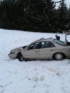 Eston Clayton sustained a bump to the head after he lost control of his car near Syracuse this morning and struck a tree. (Photo by Deb Patterson)