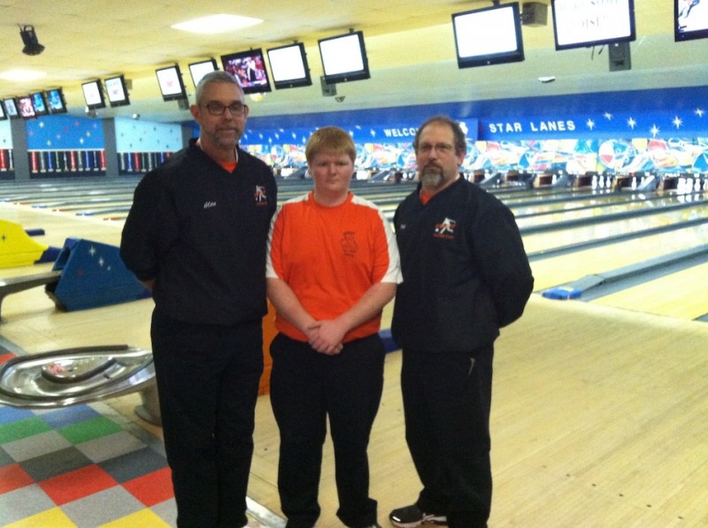 WCHS sophomore Chris Stichter will also compete as an individual in the bowling semi state Saturday. Pictured above is Stichter (center) with coaches Glen Ransbottom (at left) and Kirk Wyman (at right)  (Photo provided)