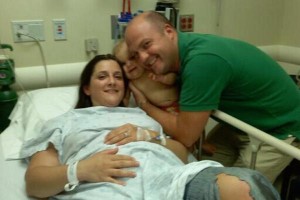 Melissa and Gabe Fitzsimmons and their daughter, Aubrey, in the hospital on Aug. 22, 2011. (Photo provided)