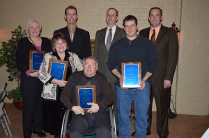 A number of individuals were recognized during the annual Kosciusko County Soil and Water Conservation District Annual Meeting Tuesday night. Shown are some of the award recipients. In front, from left, are Carole Koos and Paul Sibray, Environmental Education Award recipients; and Darrel Byer, River Friendly Farmer Award. Standing in back are Jackie Horn, Environmental Education Award; and Scott Brown, Stanley Brown and Neil Brown of the A.J. Brown and Sons Farm which received the Conservation Farmer of the Year Award. (Photo by Deb Patterson)