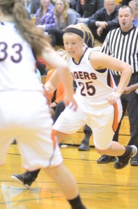Lindsay Baker makes her way on a drive to the basket for Warsaw Tuesday night versus Elkhart Memorial.