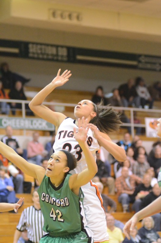 Jennifer Walker-Crawford gets boxed out by Concord's Michelle Detwiler after putting up a close range shot Friday night.