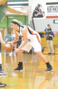 Warsaw senior standout Lindsay Baker looks for room versus Concord Friday night.