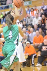 Warsaw senior Gabby Monroy puts up a shot in sectional play Friday night.