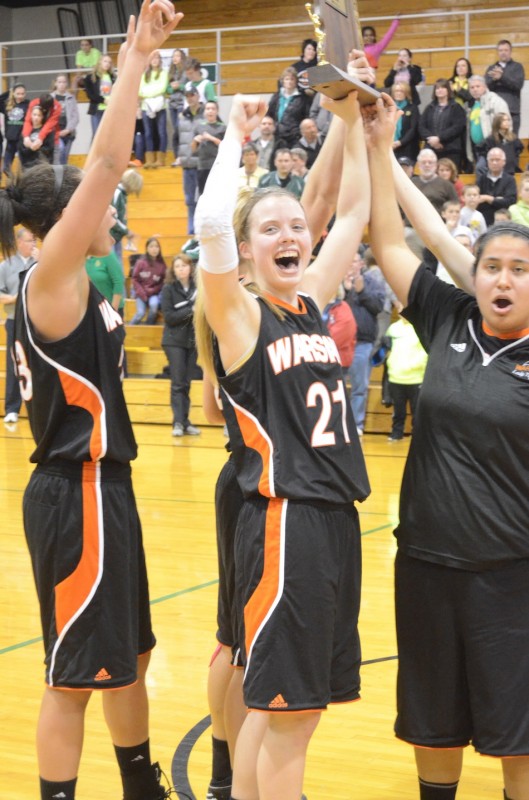 Warsaw seniors Melanie Holladay and Gabby Monroy celebrate a sectional championship Saturday night at Concord.