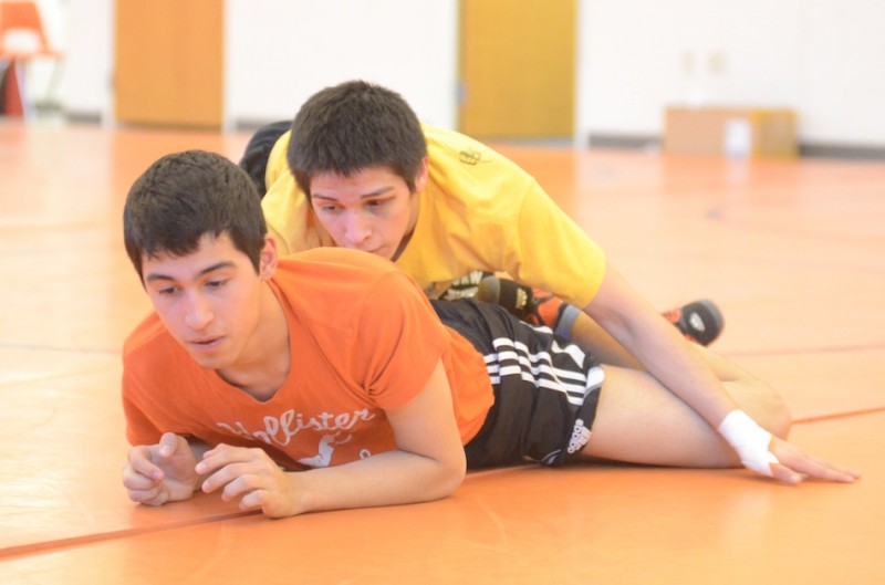 Warsaw senior Luis Munoz (top) sharpens his skills with teammate Rene Adame at practice Wednesday. Munoz  will compete in the State Finals starting Friday night in Indianapolis. 