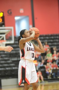 Grace College standout Juaneice Jackson prepares to let fly with a 3-pointer Wednesday night. 