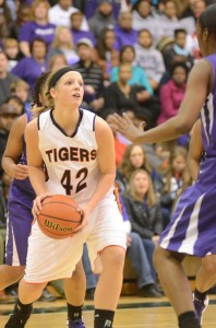 Nikki Grose heads for the hoop versus Merrillville. The junior had 13 points and 16 rebounds in a 42-41 win in the regional final.