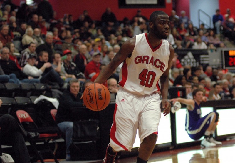 Karl Columbus looks to attack for Grace College Saturday. The former South Bend Riley star scored 11 points as the Lancers beat Taylor in their regular-season finale (Photo provided by Grace College Sports Information Department)