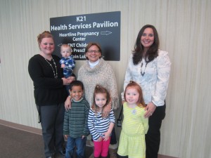 From left are Amy Rosswurm, TNT program coordinator; District 22 State Rep. Rebecca Kubacki; Angie Wood, HPC executive director; and children from TNT Childcare and Preschool Ministry. (Photo provided)
