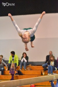 Wawasee's Taylor Busse flips from the beam during Wawasee's meet Monday night at West Noble. (Photos by Nick Goralczyk)