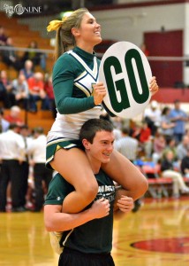 Wawasee cheerleaders Breanna Weisser and Derrick Sorensen try to rally support at Goshen.