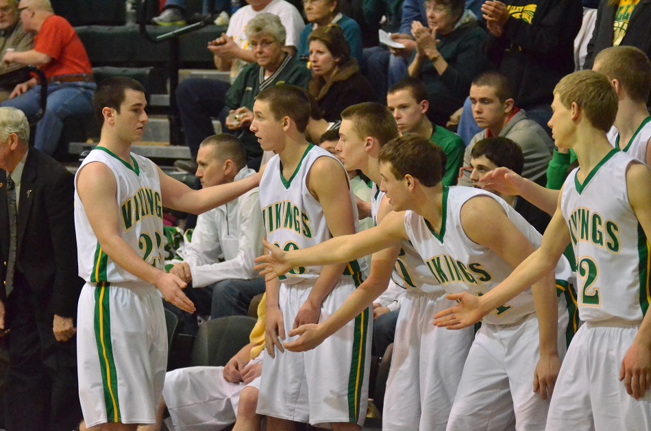 Friday's leading scorer, Nick Kindig gets a warm reception from his teammates towards the end of Friday's game.