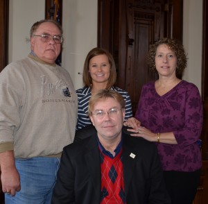 Kosciusko County Republicans held a re-organization meeting this morning. Randy Girod, seated, was elected to his second consecutive term as party chairman. Also elected was Steve Foster, treasurer; Christy Polk, secretary; and Marsha McSherry, vice chair. (Photo by Stacey Page)