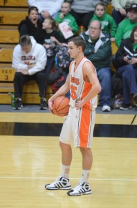 Jordan Stookey holds the ball as Warsaw stalls versus Concord in the second half Friday night.