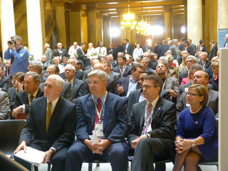 From left, Indiana Gov. Pence, Warsaw Mayor Joe Thallmer, Evansville Mayor Lloyd Winnecke and Rep. Kubacki listen to speakers at the IACT presentation. (Photo provided)