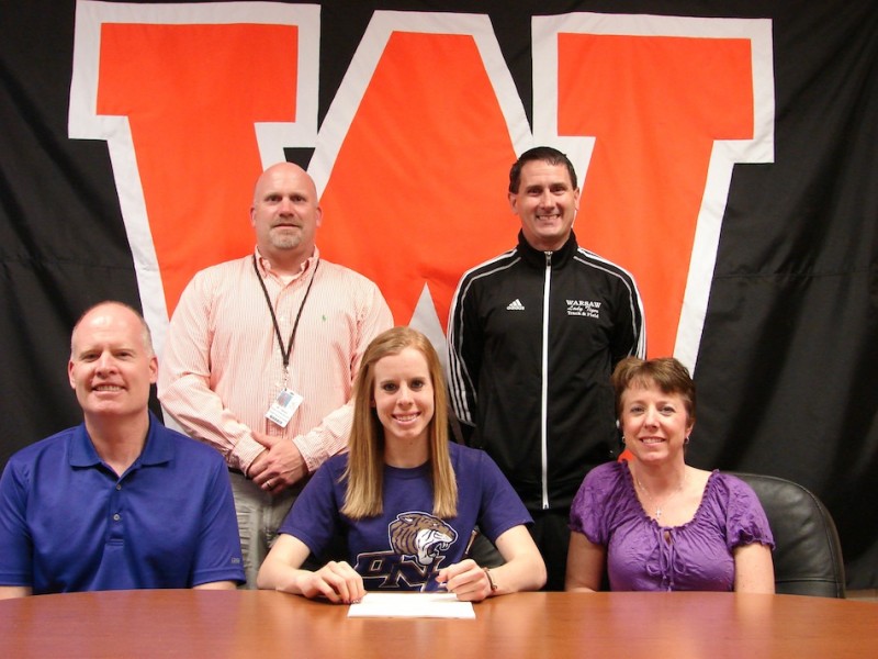Warsaw senior and three-sport athlete Sarah Ray, seated in the middle in the front row above, will run cross country at Olivet Nazarene University (Photo provided)