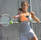 Junior Sarah Boyle, shown playing No. 3 singles in 2012, is a key returnee for a deep and talented Warsaw tennis team this spring (Photo by Mike Deak)